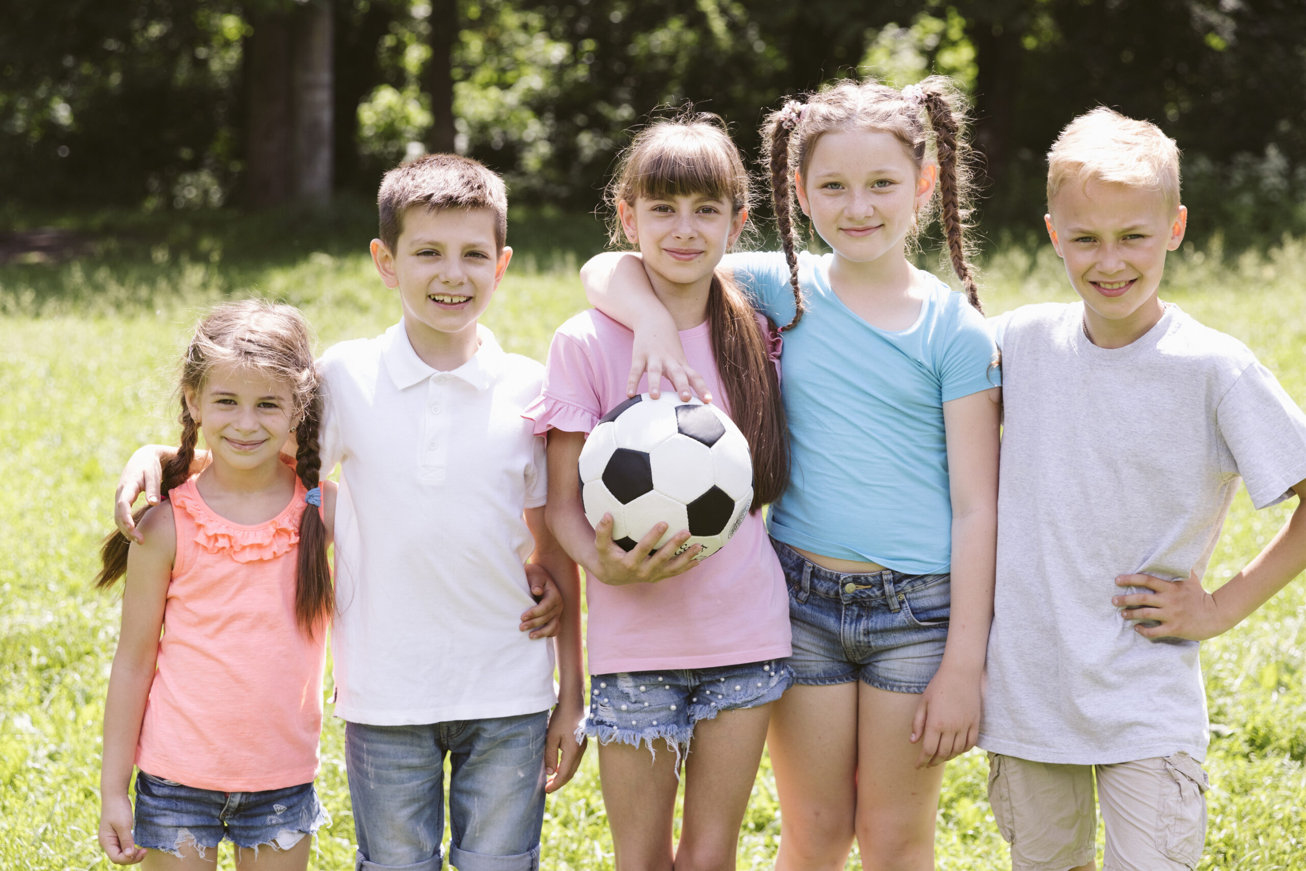 front-view-smiley-kids-posing